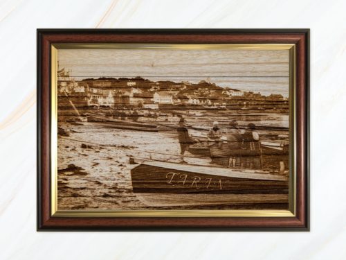Wooden pyrograph of Taran on Town Beach
