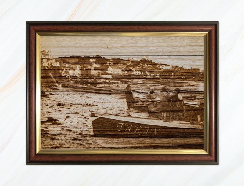 Wooden pyrograph of Taran on Town Beach
