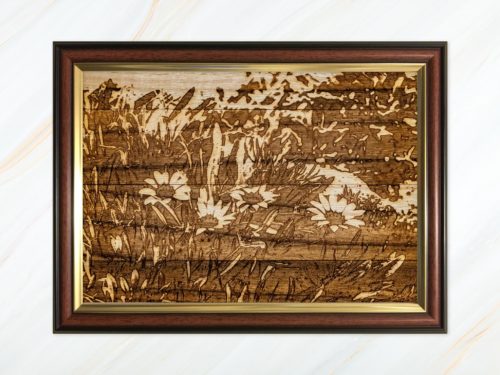 Wooden pyrograph of flowers in Scilly