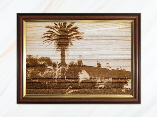 Wooden pyrograph of palm tree on St Mary’s