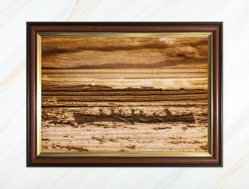 Wooden pyrograph of St Agnes start line