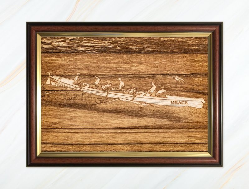 Wooden pyrograph of Grace racing