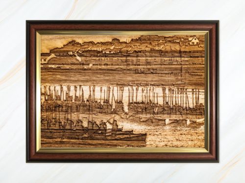 Wooden pyrograph of gigs rafting up