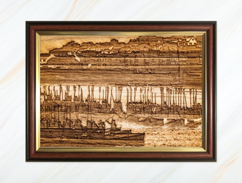 Wooden pyrograph of gigs rafting up