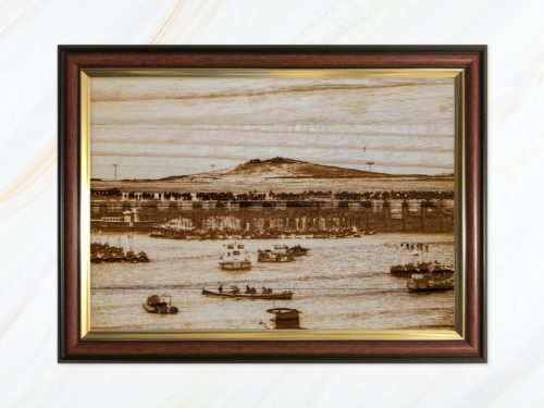 Wooden pyrograph of Samson and gigs rafting