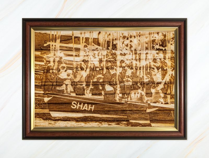 Wooden pyrograph of gigs rafting up