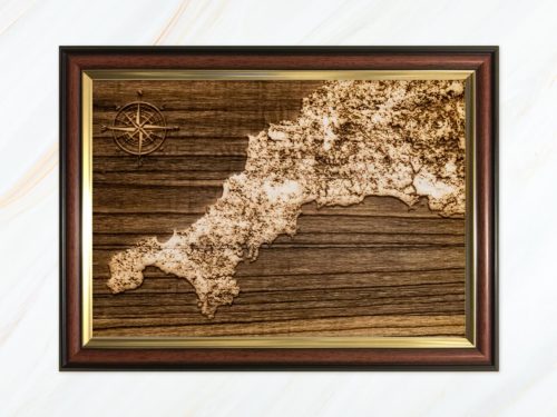 Wooden pyrograph of map of Cornwall dark