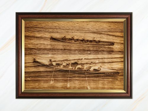 Wooden pyrograph of two gigs racing